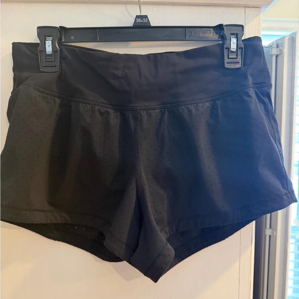 This is a pair of black Lululemon Final Lap running shorts! size 6!